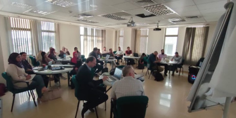 people from local SMEs in a workshop setting