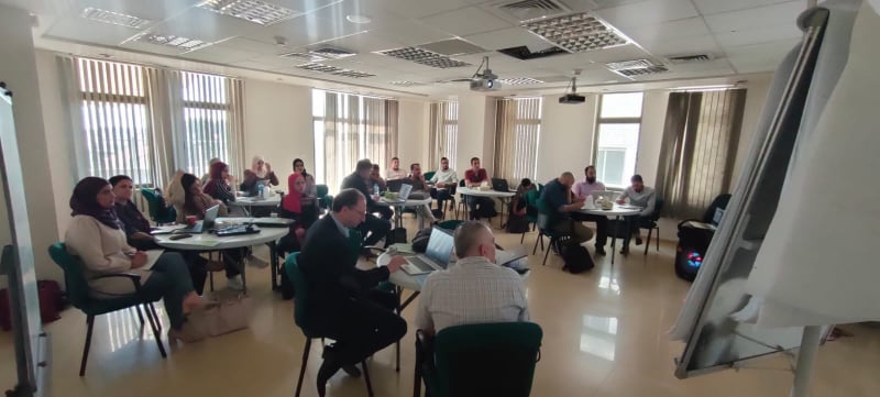 people from local SMEs in a workshop setting